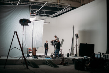 Carts, rails for filmmaking. Director of photography and engineer of movie camera trolley on set.