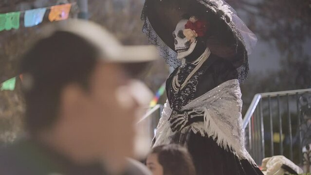 Person with the traditional skeleton custome for the day of the death, dia de los muertos 