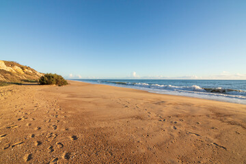 One of the most beautiful beaches in Spain, called (Cuesta Maneli, Huelva) in Spain.  Surrounded by...