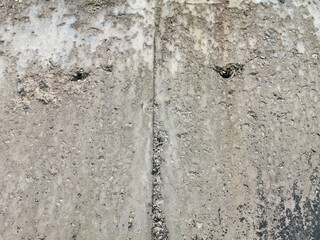 Textures. Cement wall wear on the edge of the sea. Art made by nature. Wear, algae, molluscs, lichens, wind and rain also make art.