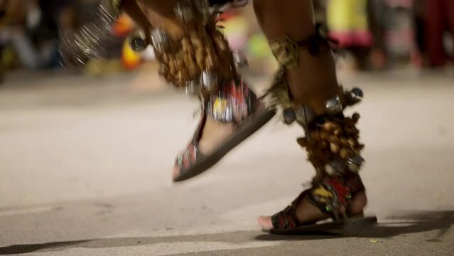 Legs of a person performing the traditional Mexican Aztec dance
