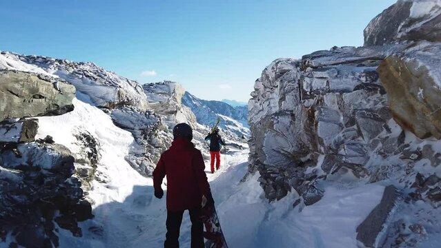 Climbing to the top of the mountain for the freeride at Hintertux. Beauty of the Glassier and mountains