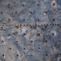 Old metal plate. For use as a background or texture.