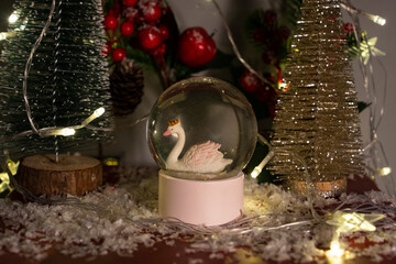 Fototapeta na wymiar Snow Globe and Christmas Decorations Background Photo, Uskudar Istanbul, Turkey
