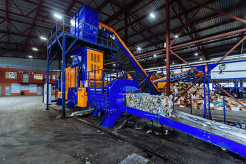 Modern waste processing plant. Sorting, pressing and packing of garbage