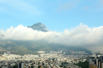 Picturesque view of beautiful cityscape near mountain