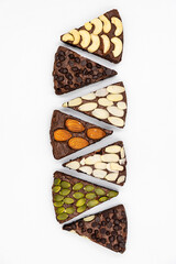 Brownies various pieces on white background.