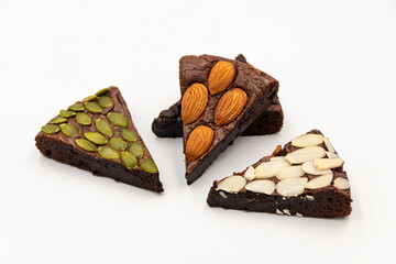 Brownies various pieces on white background.