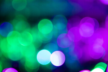 natural bokeh and bright purple lights. Vintage Magic background with colorful bokeh.