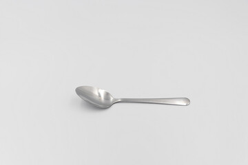 Stainless steel spoon isolated on white background.