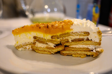 Traditional Portuguese cake with cream, fruits and cookies