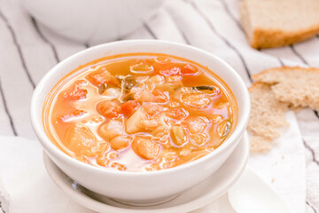 Italian tomato soup in a white bowl