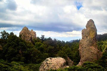 landscape in the woods with big rocks for climbers with sky full of clouds on mineral del chico hidalgo