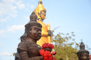 Fototapeta na wymiar Side view of Thao Werasuwan black color at Chulamani Temple, Samut Songkhram Province. Thailand