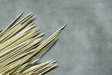 bamboo skewers with concrete background ready to use
