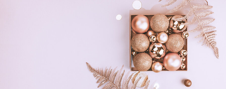 Christmas golden decorations, balls and shiny decorative plants