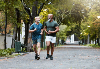 Mature, men and fitness with friends running in park for exercise, workout and wellness....