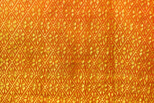 Handmade Indian sari / saree with golden details, woman wear on festival, ceremony and weddings, expensive sarees are famous for their gold and silver zari, brocade. Incredible India.