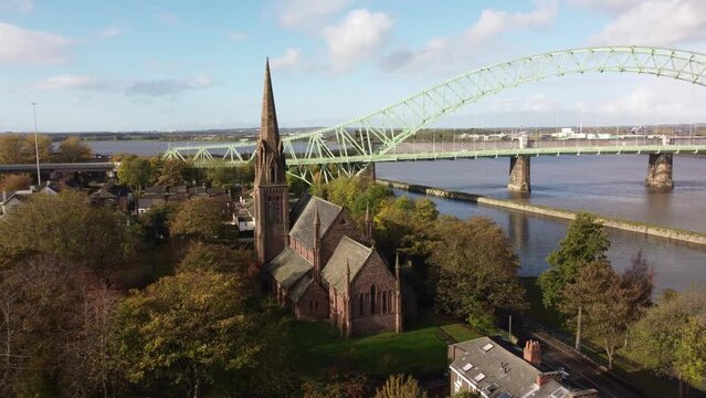 Old town Runcorn All saints church in suburban townhouse Merseyside aerial view