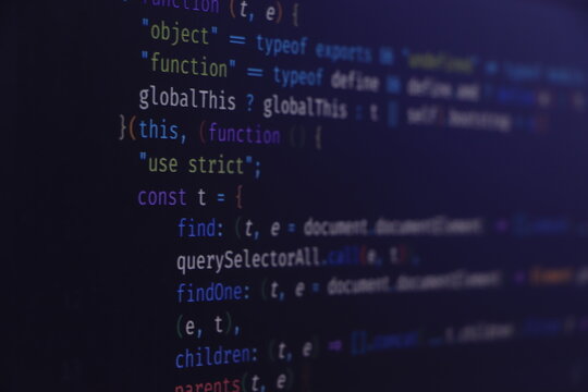 Programming Javascript on laptop computer screen. Program code PHP HTML CSS of site. Computer code on laptop (web developing). Template of website, selective focus