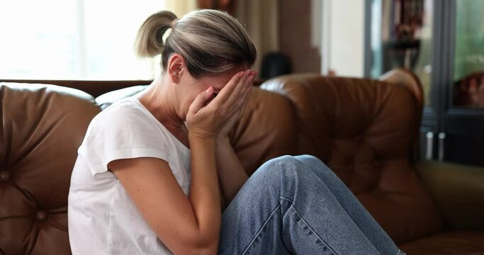 Young female victim suffering from abuse, harassment and depression or heartbreak