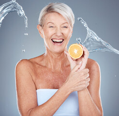 Face, lemon and skincare senior woman in studio portrait with water splash mockup for facial,...