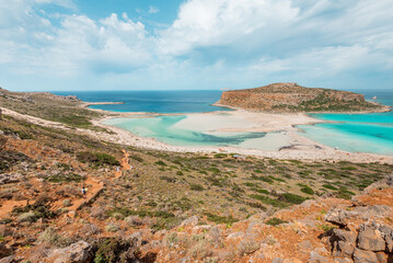 Balos lagoon, crete island, greece: view to tigani island with white sandy beach and turquoise blue water at the main tourist destination near chania
