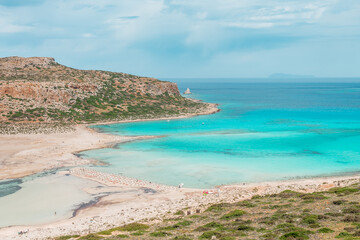 Balos lagoon, crete island, greece: view to tigani island with white sandy beach and turquoise blue water at the main tourist destination near chania