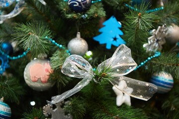 Elegant decorated with balls and figures Christmas tree