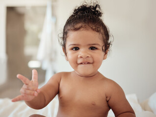Baby, rock and roll hand sign, portrait in bed, morning and happy, cool kid with rocker expression...