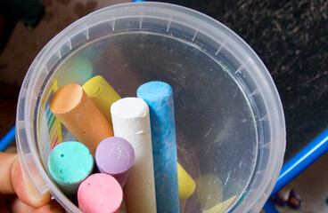 Colored crayons for drawing in a jar. Close-up