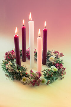 real traditional christian religious advent wreath with 5 candles, 5 candles burning