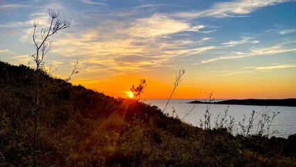 View of sunset over the Tower of Omigna, Close to Plage de Peru (Peru Beach), Corsica, France
