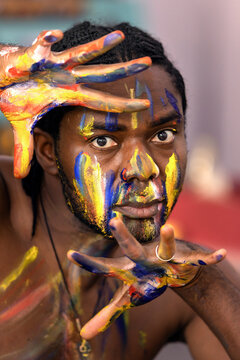 Painting male african portrait oil on face detail. Art portrait of black man, fashion model with abstract drawings.