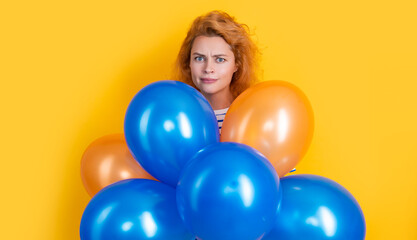 happy birthday woman hold balloons in studio. serious woman with balloon for birthday party