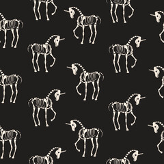 Seamless texture. Skeletons of unicorns on a dark background. For fabric, background, textiles, wallpaper.
