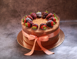 beautiful delicious dessert cake with fresh strawberries in chocolate
