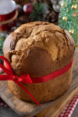 Traditional Christmas panettone on wooden table