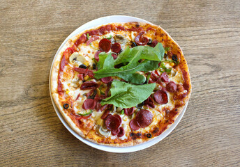 pizza on a white plate
