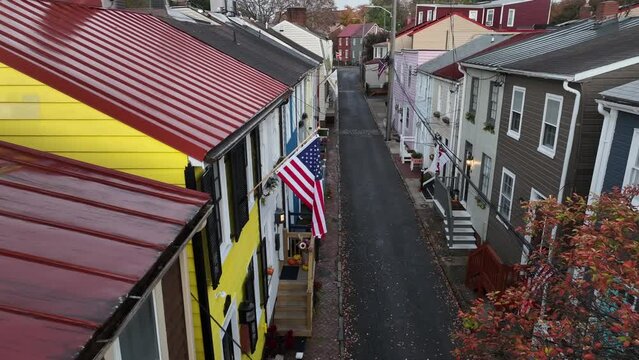Quaint historic colonial American homes restored in modern day. Tourist attraction in USA. Aerial view.