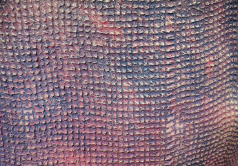 Red clay texture of a canvas print on a fragment of a ceramic amphora. .