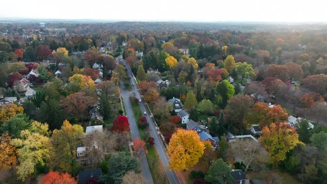 Mansions in America. Historic residential district in USA during autumn. Aerial reveal.