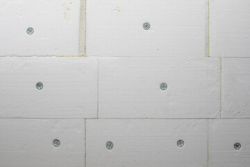 Polystyrene facade insulation sheets on house wall