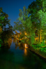 River at night in Pordenone, Italy