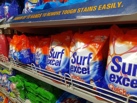 collection of surf excel in supermarket display rack. closeup side view.