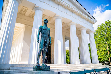 Statue of a naked man in VOLKSGARTEN in Vienna, Austria