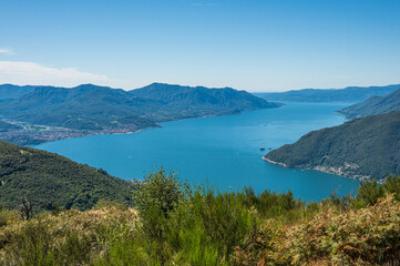 Fototapeta na wymiar Aerial view of the Lake Maggiore with blue sky from a mountain