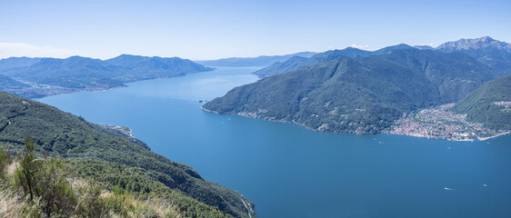 Fototapeta na wymiar Extra wide angle Aerial view of the Lake Maggiore with blue sky from a mountain
