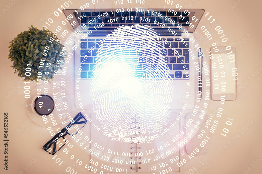 Poster Finger print over computer on the desktop background. Top view. Double exposure. Concept of securitization.