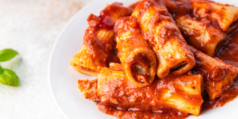 pasta cannelloni tomato sauce dish stuffed meal food snack on the table copy space food background top